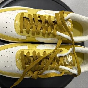 Nike White and Gold Athletic Shoes